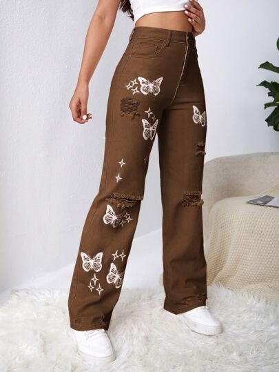 SHEIN EZwear بنطلون جينز باهت اللون بتفاصيل ممزق فراشة