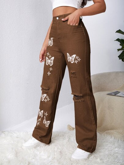 SHEIN EZwear بنطلون جينز باهت اللون بتفاصيل ممزق فراشة