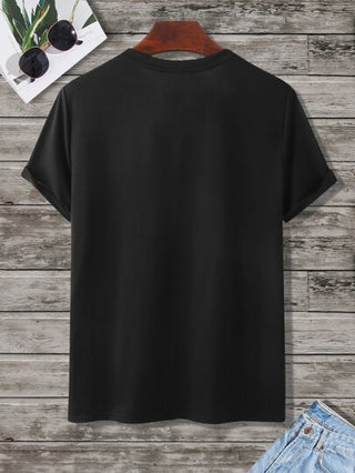 Manfinity Homme تي شيرت بجرافيك شعار وزهر للرجال