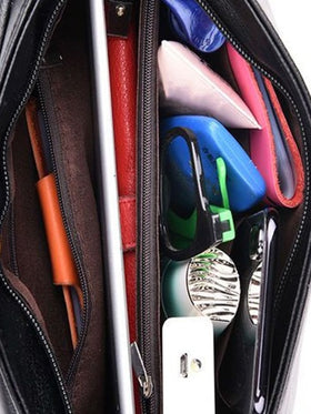 حقيبة مربعة بديكور معدني تفاصيل الغرزة رفرف