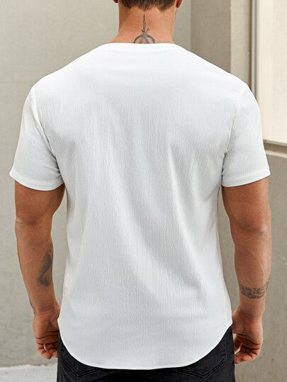 Manfinity Homme قميص كاجوال ذو تصميم فضفاض بلون أحادي للرجال مع أزرار