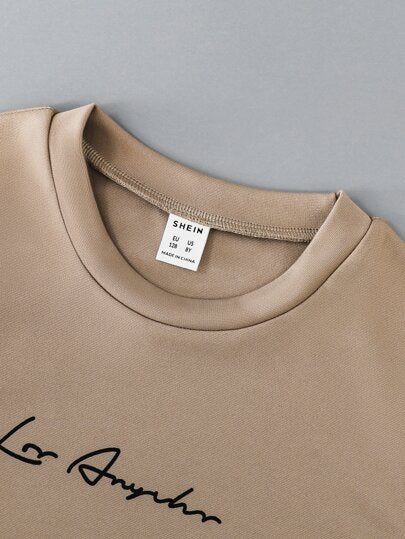 SHEIN تي شيرت بطباعة شعار ولد