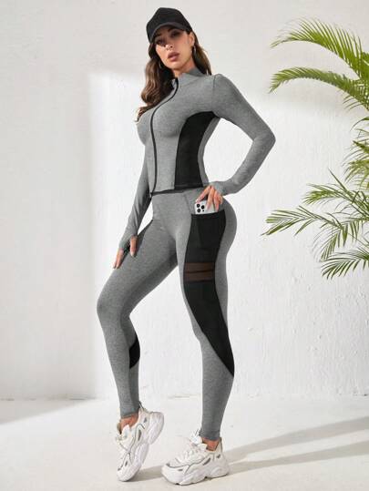 Easithlete مجموعة رياضية للنساء تشمل اكمام مع فتحات للإبهام ومن قماش الشبكة ذو تباين في الألوان