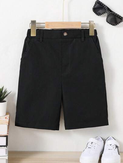 SHEIN شورت صبي فتوة بجيوب مائلة واضحة اللون