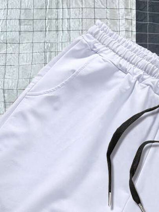 Manfinity Sporsity بنطلون قصير بطباعة أحرف رباط خصر للرجال