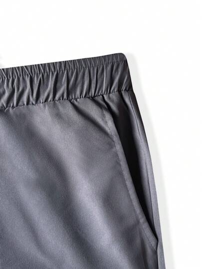 Manfinity Homme شورت رجالي فضفاض مع جيوب مائلة وخصر بسحاب