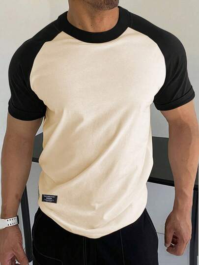Manfinity Homme تي شيرت ألوان متباينة اكمام راجلان بتفاصيل مرقع للرجال