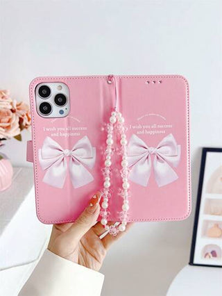 غطاء معصم مزين بفردة وردية كبيرة من اللؤلؤ الزائف متوافق مع أجهزة iPhone 16, iPhone 16 Pro, iPhone 16 Plus, iPhone 16 Pro Max, Galaxy S25 Ultra, Galaxy S24 Ultra 5G