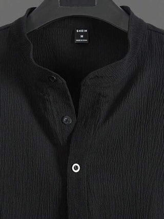 Manfinity Homme قميص نصف أزرار رجالي بلون صلب و قَصَّة فضفاضة