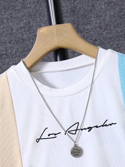 SHEIN تيشيرت كتابة جرافيكية ثنائي اللون للأولاد