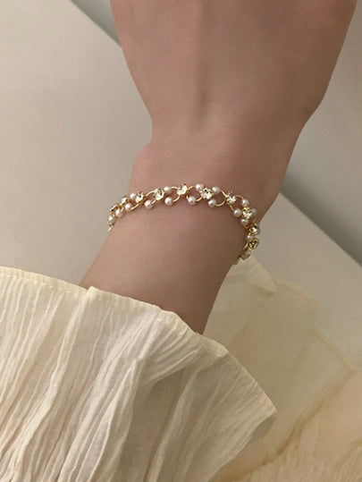 سوار مزين بحجر الراينستون ولؤلؤة اصطناعية
