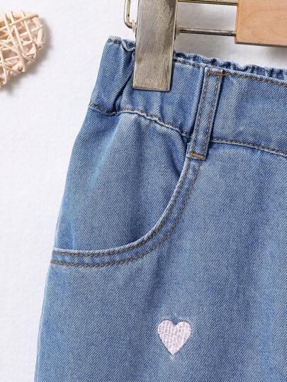 SHEIN بناطيل جينز بطراز شارع العطلات الريفية مطبوع عليها قلب جميل للفتيات المراهقات