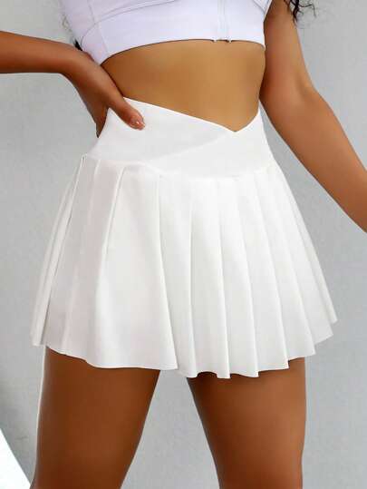 SHEIN Sovereign Charm تنورة رياضية مطوية واسعة الخصر بجيب للهاتف، طقم تنس للنساء