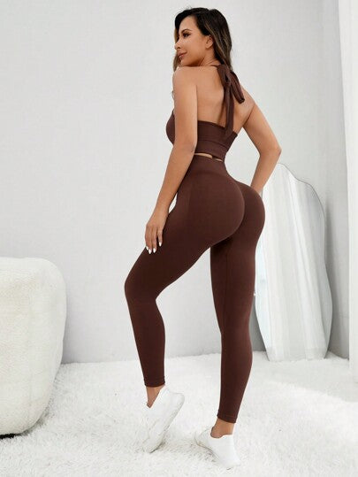 SHEIN Sport Studio طقم رياضي للنساء بتصميم رياضي خالي من الظهر وبمطاطية عالية، دون شي