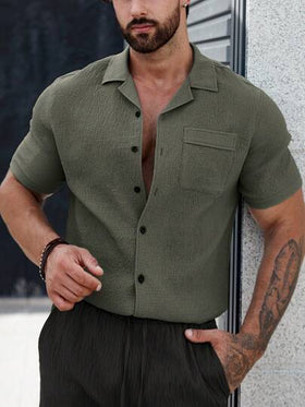 Manfinity CasualCool قميص موحدة اللون أزرار علوية جيب مرقع للرجال