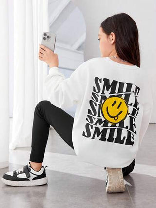 girls-sets بلوفر وبنطال ضيق بكتف منسدل وطبعة وجه كرتونية من Tween Girl