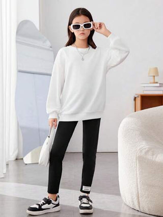 girls-sets بلوفر وبنطال ضيق بكتف منسدل وطبعة وجه كرتونية من Tween Girl