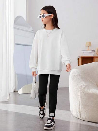 girls-sets بلوفر وبنطال ضيق بكتف منسدل وطبعة وجه كرتونية من Tween Girl