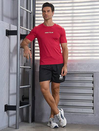 Manfinity Sport Corelite قميص رياضي رجالي مطبوع عليه حروف