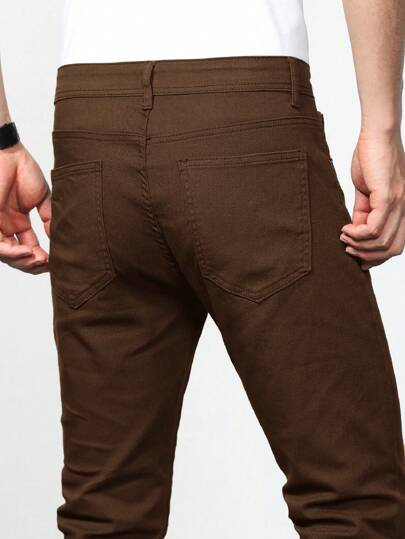 Manfinity Homme بنطال جينز رجالي ضيق بجيوب مائلة