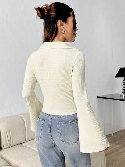 Flirla قميص نسائي بأكمام جرس بلون سادة