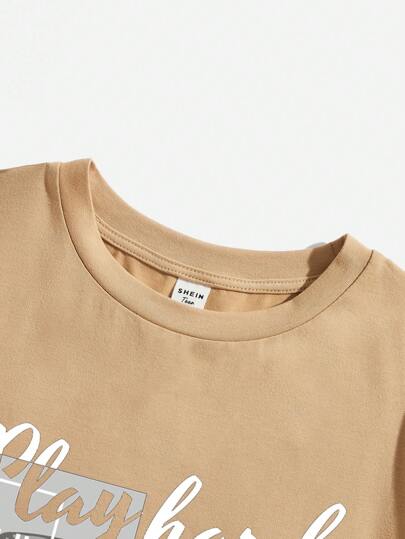 SHEIN قميص صيفي قصير الأكمام برقبة دائرية لفتى العمر الوسطى ذو رسوم كرتونية