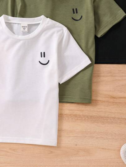 SHEIN قميص دائري الرقبة مطبوع عليه وجه طفل يبتسم للرجال الشباب الكاجوال لفصل الصيف