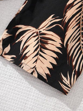 SHEIN طقم بلوزة بليسي صلبة وقميص نوم قصير بطبعة استوائية لفتاة في فترة البلوغ