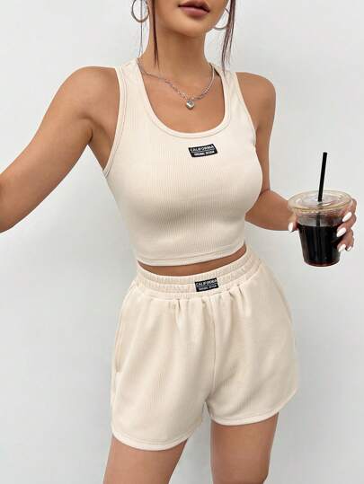 SHEIN EZwear طقم سترة وشورت محبوك بتفاصيل رقعة للسيدات
