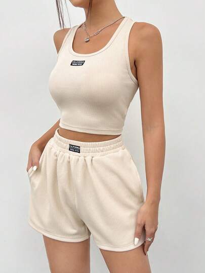 SHEIN EZwear طقم سترة وشورت محبوك بتفاصيل رقعة للسيدات