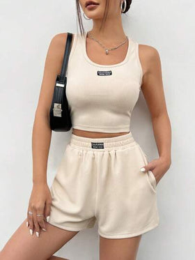 SHEIN EZwear طقم سترة وشورت محبوك بتفاصيل رقعة للسيدات
