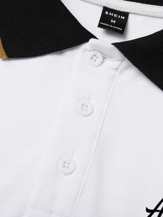 Manfinity Homme قميص بولو رجالي بأكمام قصيرة وكتلة ألوان، طبعات جرافيكية على الياقة للعمل والأزياء الرجالية و الأب والإبن