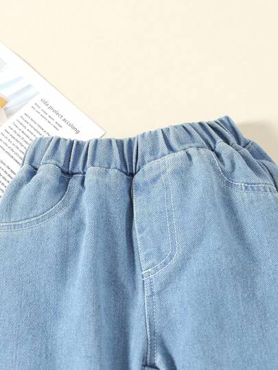SHEIN بنطلون جينز دنيم عتيق مطرز بأشكال قلوب لأسلوب شارع عادي للفتاة الصغيرة