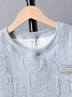 SHEIN مجموعة قميص تي شيرت بأكمام قصيرة و شورت لولدين عمرهما بين 8 و 14 عامًا