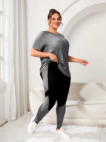 SHEIN Sport Studio طقم ملابس رياضية للمرأة كبيرة الحجم يشمل تي شيرت برقبة دائرية وأكمام راغلان وليجنز متناسقة الألوان