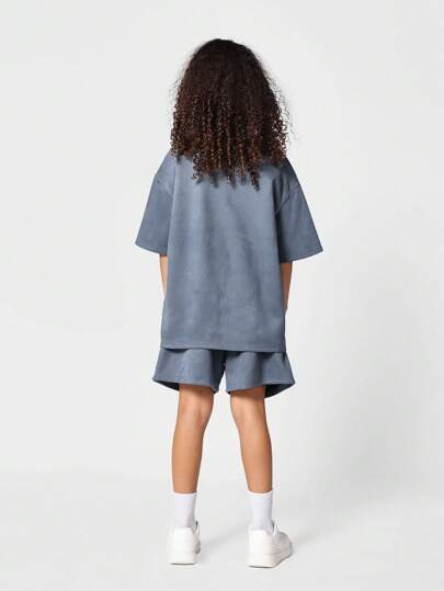 girls-sets SUMWON مجموعة قطعتين تتكون من تي شيرت اوفرسايز ومشورت قصير ذو خصر منخفض مطرز للفتيات المراهقات