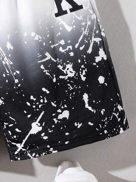 SHEIN طقم ملابس صبياني عمر البلوغ مناسب بتصميم طباعة التاج والحروف بتدرج الألوان و قميص بأكمام قصيرة وشورت فضفاض للارتداء العادي