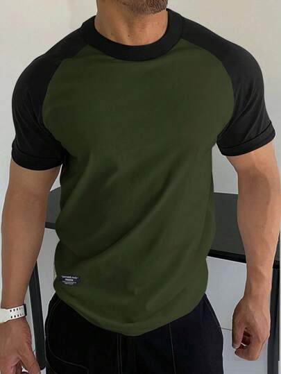 Manfinity Homme تي شيرت رجالي بأكمام رغلان وخياطة بألوان متباينة