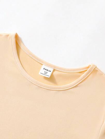 SHEIN Vintaside Kids مجموعة 3 قطع لفتاة في فترة البلوغ (توين) تتضمن تي شيرت رياضي بأكمام قصيرة وشورت بعدة ألوان