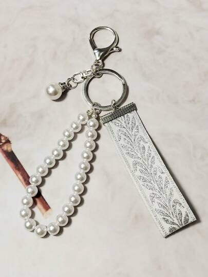 سلاسل مفاتيح نسائية من اللؤلؤ الاصطناعي مفتاح فضة جاكار ليف، مفتاح نسائي راقي للحقائب معدنية جذابة، سلسلة مفاتيح رفيعة نمط الشريط النسائية، سلسلة مفاتيح عصرية عامة، مزينات مفاتيح نسائية لإكسسوارات المدرسة الرجوع للمدرسة، هدايا للمعلمات