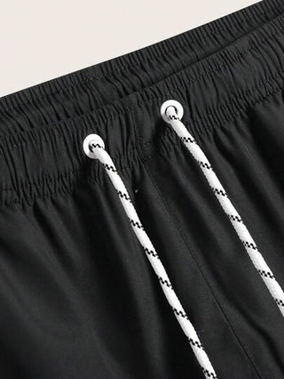 Manfinity KASUA شورت شاطئ خصر قابل للشد بلون سادة للرجال (قطعتان/عبوة)