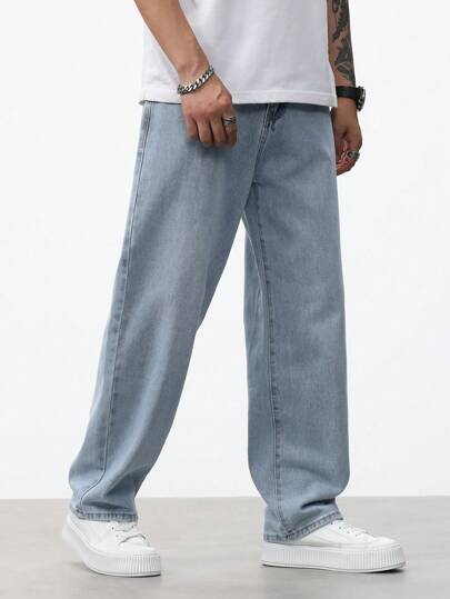 Manfinity Homme جينز رجالي بقصة مستقيمة بسيط ومتعدد الاستخدامات للارتداء اليومي، بلون أزرق سادة وطويل واسع ومغسول، مناسب للخروجات و المناسبات اليومية