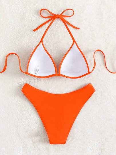 Swim Basics مجموعة بيكيني مكونة من قطعتين بسيطة وعصرية للنساء بتصميم حديث، بلونٍ واحد، تصلح لإرتدائها في فصل الصيف في الشاطئ أثناء الإجازات.