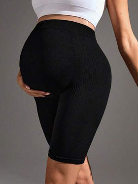 SHEIN شورت أسود للحوامل مرن لليوغا والرياضة ومريح بخصر عالي يرفع المؤخرة