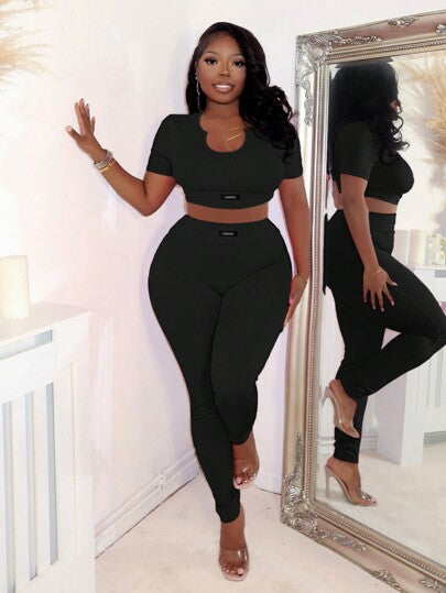 Slaydiva نساء بدلة رياضية مكونة من ملابس علوية بأكمام قصيرة وسروال قصير بلون سادة بسيط
