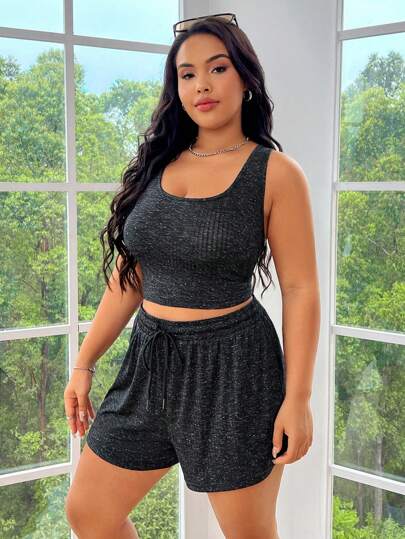 SHEIN EZwear مجموعة ملابس رياضية للسيدات بمقاس زائد من قماش الشبكة العسلية الملونة المكونة من سترة وشورت
