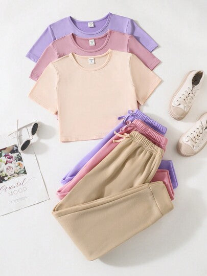 SHEIN Vintaside Kids مجموعة من ثلاث قطع للفتاة المراهقة تتضمن تي شيرت رياضي وسروال، متعدد الألوان