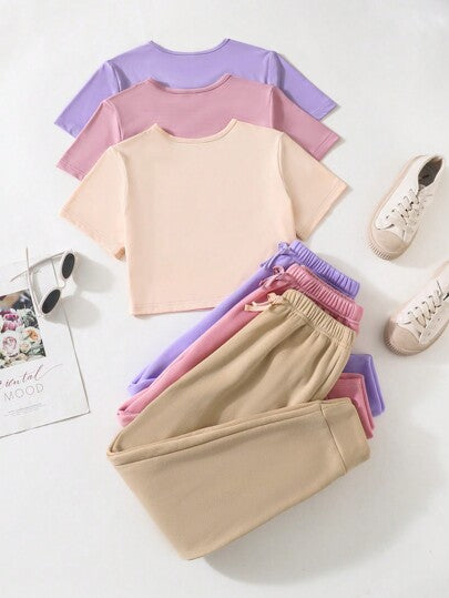 SHEIN Vintaside Kids مجموعة من ثلاث قطع للفتاة المراهقة تتضمن تي شيرت رياضي وسروال، متعدد الألوان