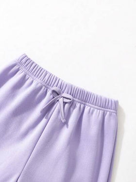 SHEIN Vintaside Kids مجموعة من ثلاث قطع للفتاة المراهقة تتضمن تي شيرت رياضي وسروال، متعدد الألوان