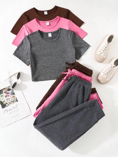 SHEIN مجموعة قميص رياضي بأكمام قصيرة وبنطلون طويل وسروال قصير لفتاة صغيرة، 3 قطع، متعدد الألوان
